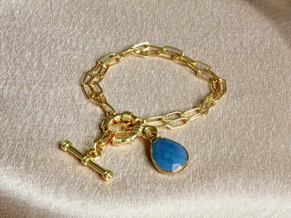 Gold Sailor-Lock Chain Bracelet with Blue Teardrop Stone