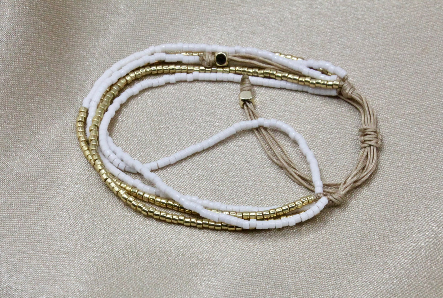 Multi-Layered Shiny Beaded Bracelet with Gold Accents