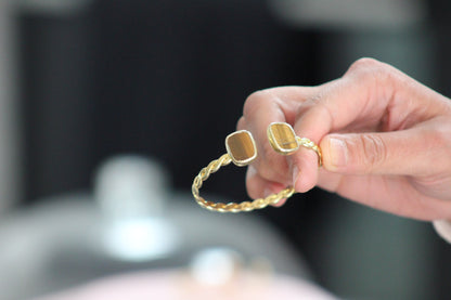 Gold-Plated Twisted Open Cuff Bracelet with Dual Stones