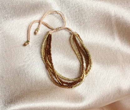 Multi-Layered Shiny Beaded Bracelet with Gold Accents