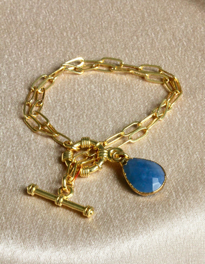 Gold Sailor-Lock Chain Bracelet with Blue Teardrop Stone
