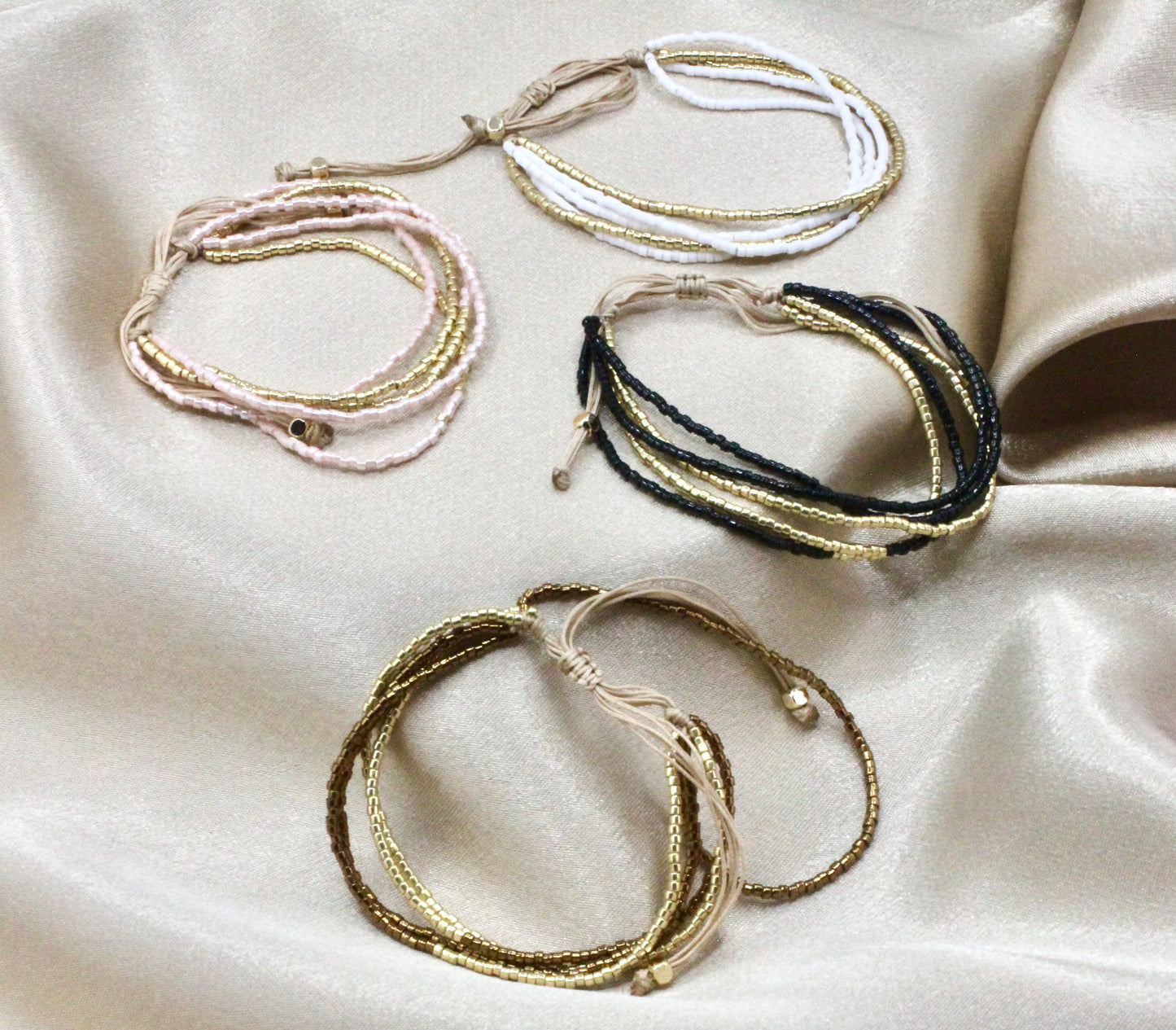 Multi-Layered Shiny Beaded Bracelet with Gold Accents