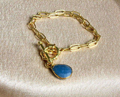 Gold Sailor-Lock Chain Bracelet with Blue Teardrop Stone