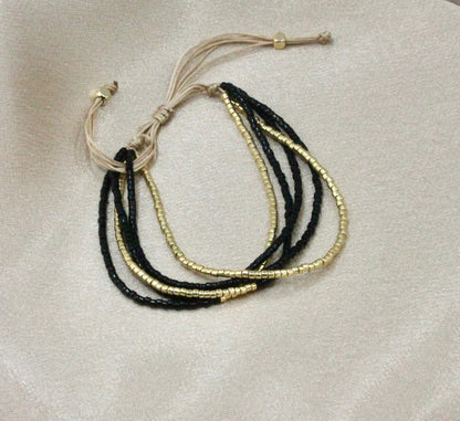 Multi-Layered Shiny Beaded Bracelet with Gold Accents