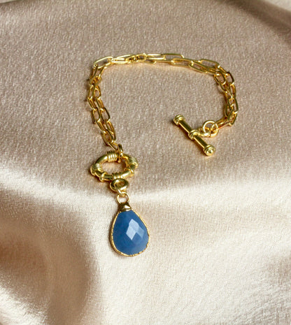 Gold Sailor-Lock Chain Bracelet with Blue Teardrop Stone