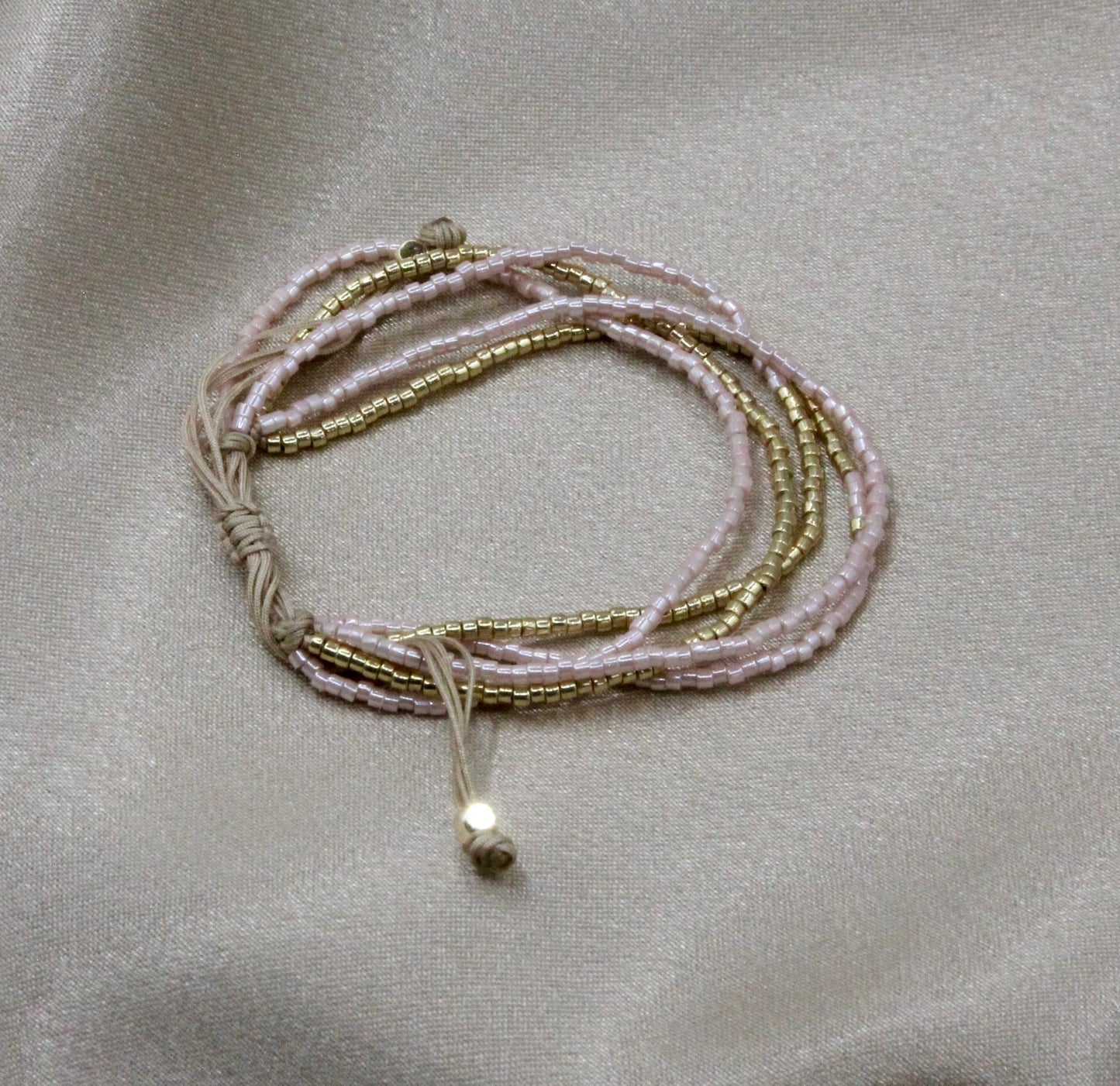Multi-Layered Shiny Beaded Bracelet with Gold Accents